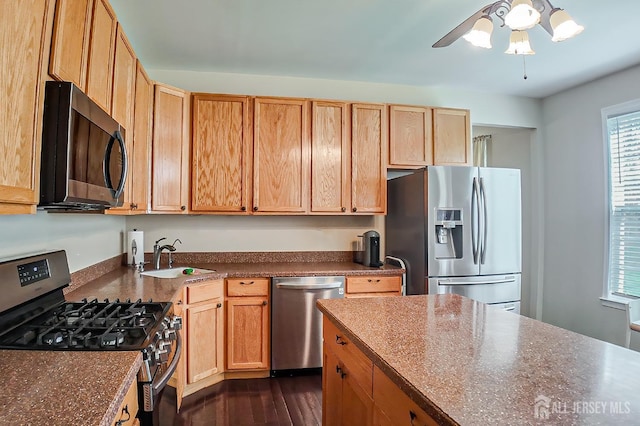 47 Bay Hill Blvd, Monroe, NJ 08831 - kitchen with stainless steel appliances, dark countertops, dark wood-style floors, and a ceiling fan