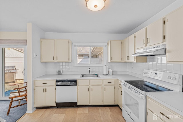 803 Pompton Rd Unit A, Monroe, NJ 08831 - kitchen with white appliances, under cabinet range hood, a sink, backsplash, and light countertops