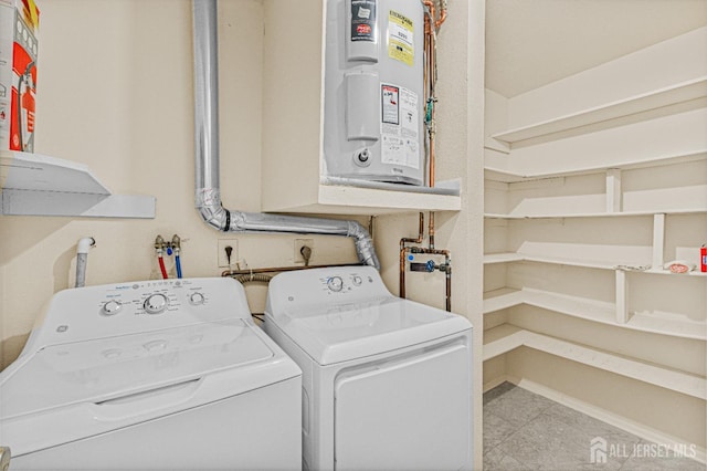 803 Pompton Rd Unit A, Monroe, NJ 08831 - laundry room with washer and clothes dryer, water heater, and tile patterned floors