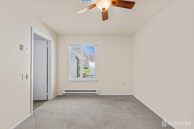 803 Pompton Rd Unit A, Monroe, NJ 08831 - carpeted empty room featuring a baseboard heating unit, a ceiling fan, and baseboards