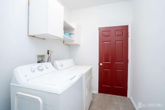 7 Sequoia Dr, South Brunswick, NJ 08810 - washroom featuring washer and clothes dryer, cabinet space, light tile patterned floors, and baseboards