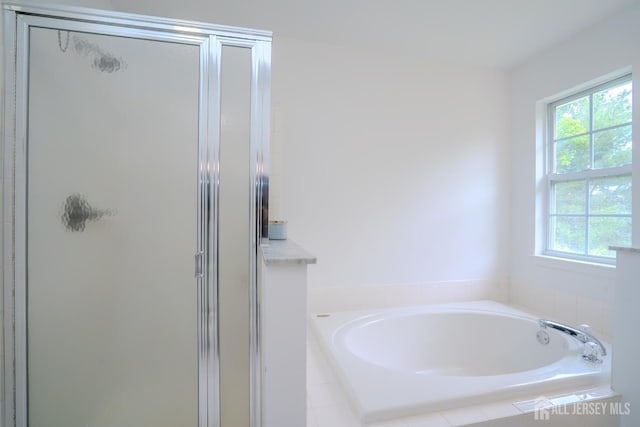 7 Sequoia Dr, South Brunswick, NJ 08810 - full bath featuring plenty of natural light, a stall shower, and a garden tub