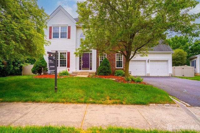 7 Sequoia Dr, South Brunswick, NJ 08810 - traditional-style house featuring asphalt driveway and a garage