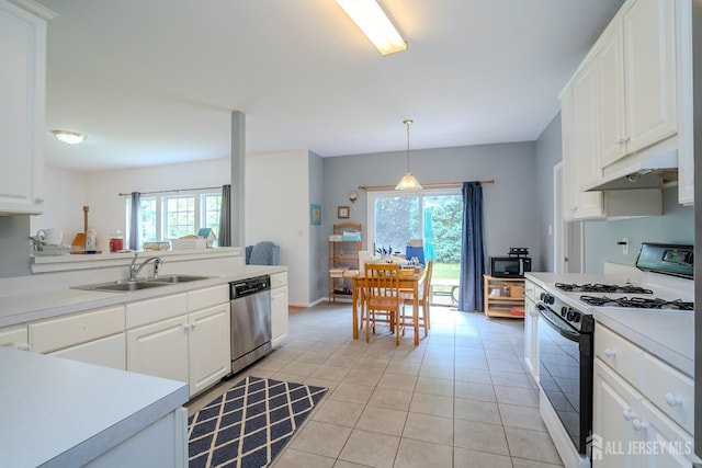 7 Sequoia Dr, South Brunswick, NJ 08810 - kitchen with range with gas stovetop, dishwasher, black microwave, and healthy amount of natural light