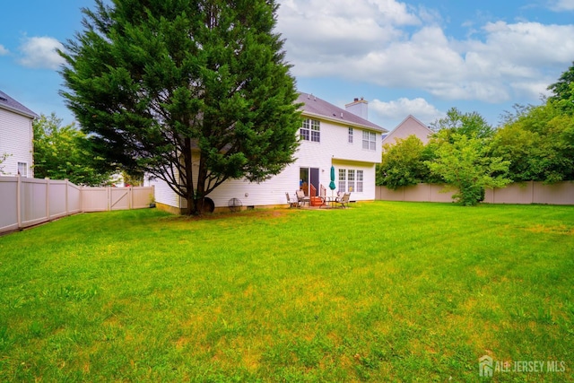 7 Sequoia Dr, South Brunswick, NJ 08810 - rear view of house with a chimney