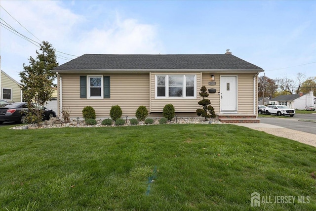 view of front of home with a front lawn and entry steps