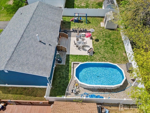 drone / aerial view of a pool area