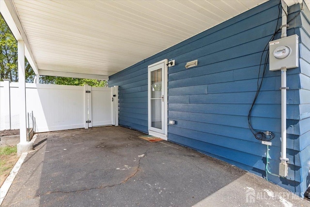 view of patio / terrace featuring a carport