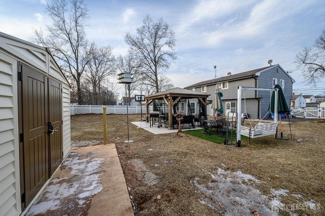 view of yard with a fenced backyard, a patio, and a gazebo