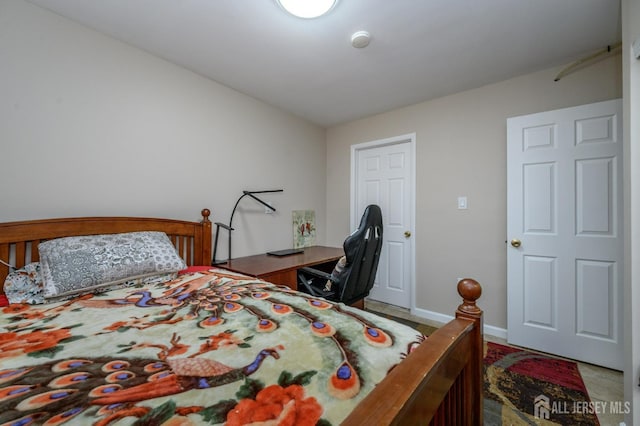 bedroom featuring baseboards