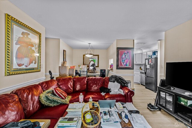 living room featuring light wood-style flooring