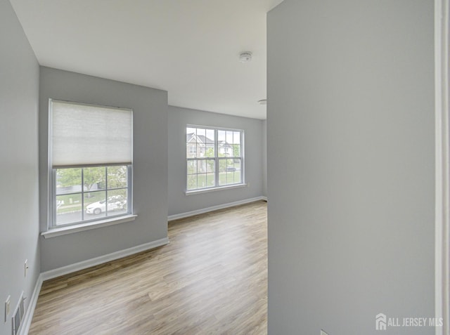 221 Morning Glory Dr, Monroe, NJ 08831 - unfurnished room featuring baseboards, wood finished floors, and a smoke detector