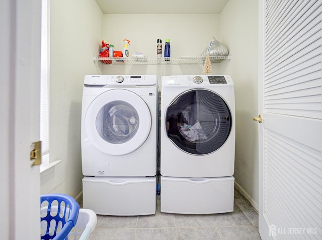 221 Morning Glory Dr, Monroe, NJ 08831 - laundry area featuring washer and dryer and light tile patterned floors