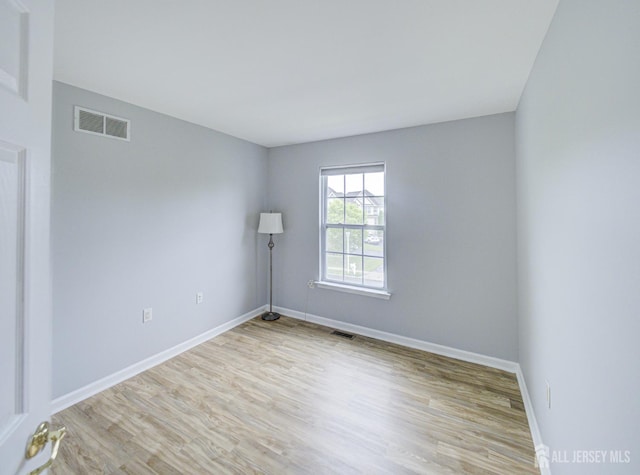 221 Morning Glory Dr, Monroe, NJ 08831 - unfurnished room featuring wood finished floors and baseboards