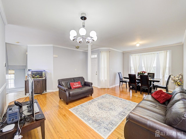 221 Morning Glory Dr, Monroe, NJ 08831 - living area with light wood-style floors, healthy amount of natural light, ornamental molding, and baseboards