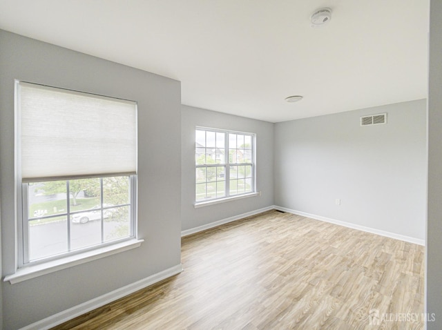 221 Morning Glory Dr, Monroe, NJ 08831 - unfurnished room with wood finished floors, baseboards, and a smoke detector