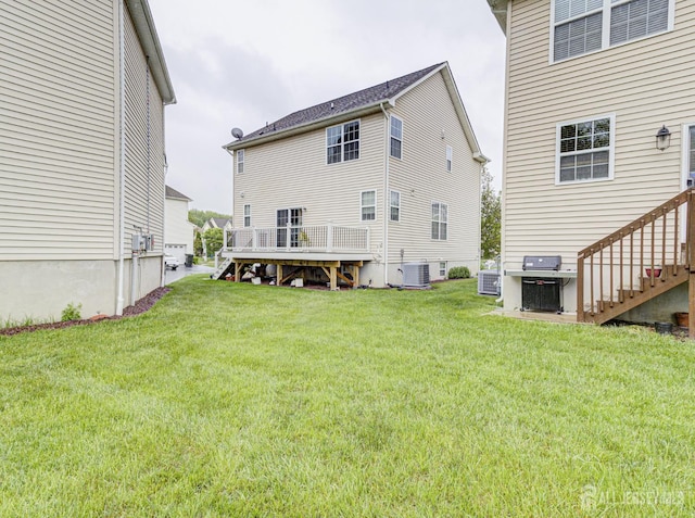 221 Morning Glory Dr, Monroe, NJ 08831 - back of house featuring stairway, central AC, a lawn, and a deck