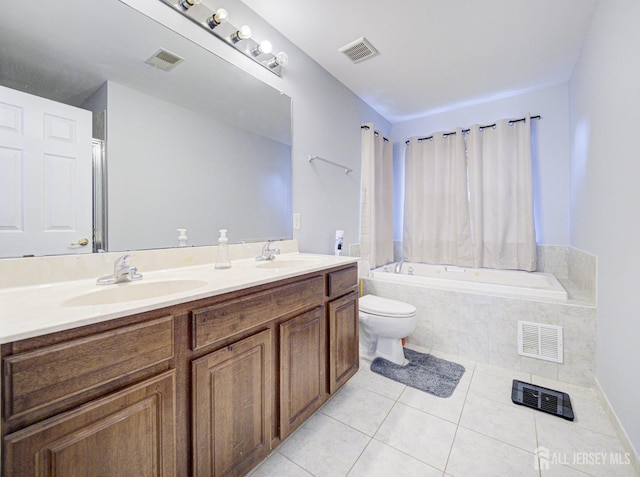 221 Morning Glory Dr, Monroe, NJ 08831 - bathroom featuring tile patterned floors, toilet, a relaxing tiled tub, and double vanity