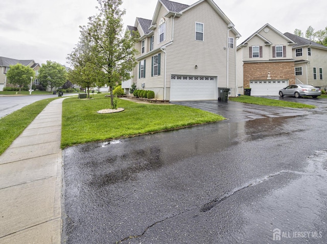 221 Morning Glory Dr, Monroe, NJ 08831 - view of property exterior with a yard, driveway, and a garage