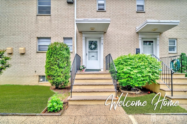 402 N Cranbury Rd Unit 8, East Brunswick, NJ 08816 - doorway to property with brick siding