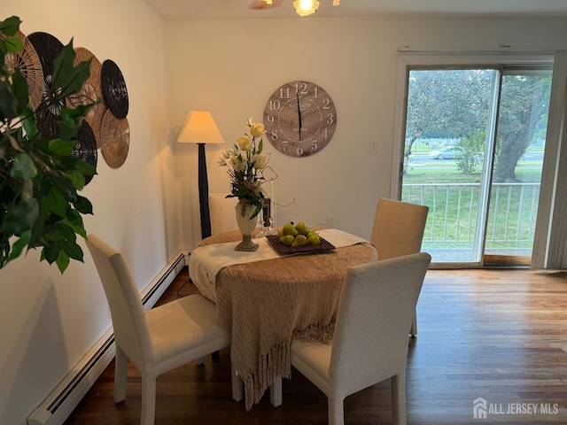 402 N Cranbury Rd Unit 8, East Brunswick, NJ 08816 - dining room with a baseboard heating unit and wood finished floors
