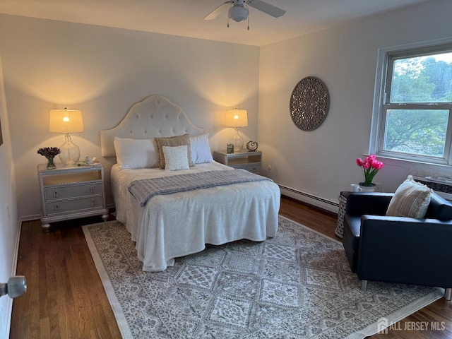 402 N Cranbury Rd Unit 8, East Brunswick, NJ 08816 - bedroom with a baseboard radiator, wood finished floors, and ceiling fan