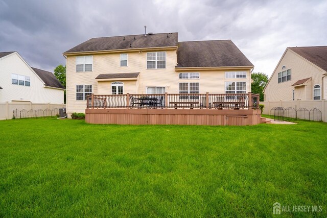 4 Bernadette Cir S, Brunswick, NJ 08852 - back of property featuring a deck and cooling unit