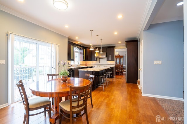 4 Bernadette Cir S, Brunswick, NJ 08852 - dining space with crown molding, baseboards, recessed lighting, and light wood-type flooring