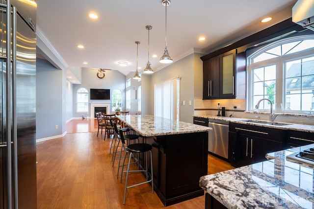 4 Bernadette Cir S, Brunswick, NJ 08852 - kitchen with stainless steel appliances, a sink, open floor plan, a center island, and a breakfast bar area