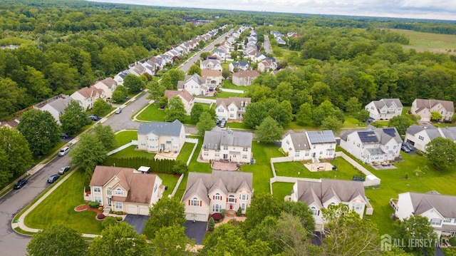 4 Bernadette Cir S, Brunswick, NJ 08852 - aerial view of residential area featuring a heavily wooded area