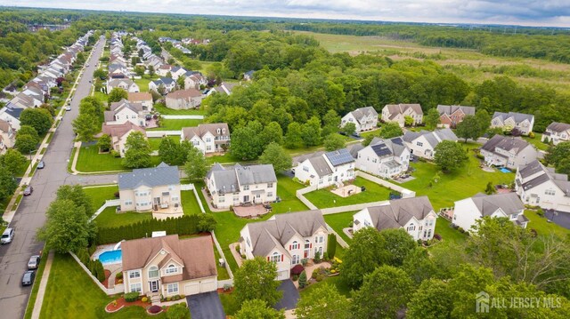 4 Bernadette Cir S, Brunswick, NJ 08852 - aerial view of residential area featuring a heavily wooded area