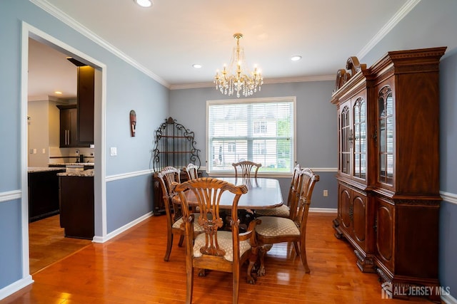 4 Bernadette Cir S, Brunswick, NJ 08852 - dining space with a chandelier, light wood-style flooring, baseboards, recessed lighting, and crown molding