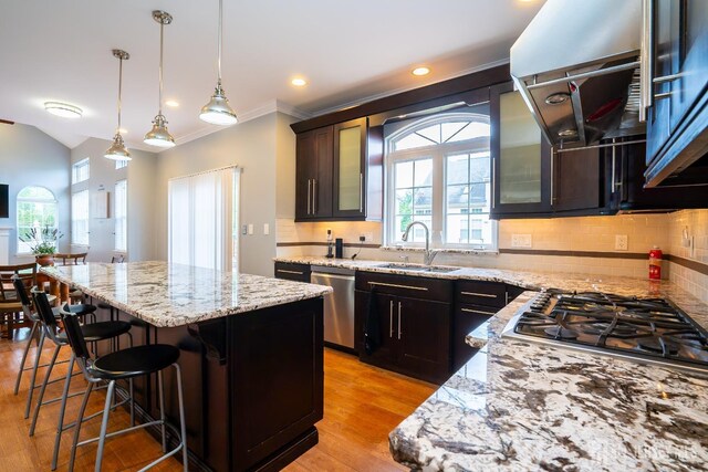 4 Bernadette Cir S, Brunswick, NJ 08852 - kitchen with a sink, appliances with stainless steel finishes, a center island, a kitchen bar, and healthy amount of natural light