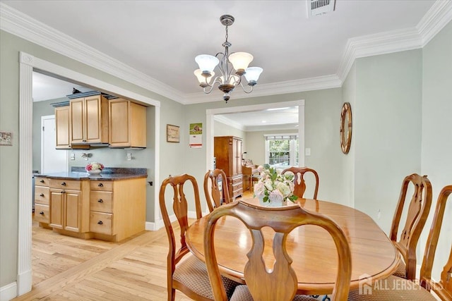 13 Sheffield Ave, Monroe, NJ 08831 - dining space with a chandelier, light wood-style floors, baseboards, and crown molding