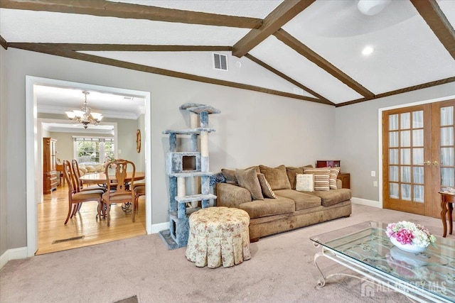13 Sheffield Ave, Monroe, NJ 08831 - living room featuring carpet, a chandelier, baseboards, ornamental molding, and french doors