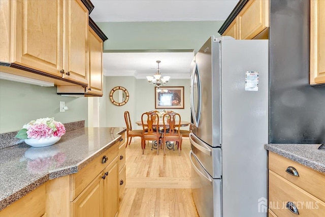 13 Sheffield Ave, Monroe, NJ 08831 - kitchen featuring light brown cabinetry, freestanding refrigerator, light wood-type flooring, and ornamental molding