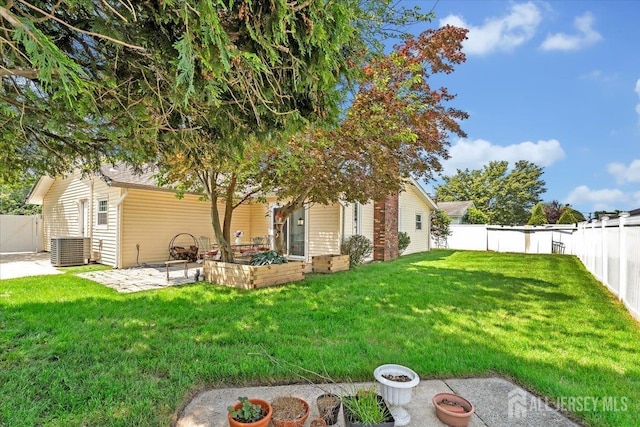 13 Sheffield Ave, Monroe, NJ 08831 - view of yard with a patio and central AC