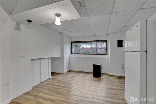 186 Hamilton Pl, East Windsor, NJ 08520 - spare room with light wood-style flooring, a paneled ceiling, and baseboards
