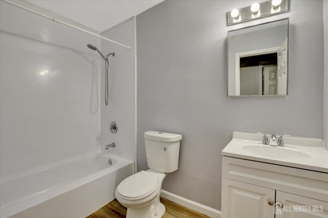 186 Hamilton Pl, East Windsor, NJ 08520 - bathroom with toilet, wood finished floors, vanity, bathtub / shower combination, and baseboards