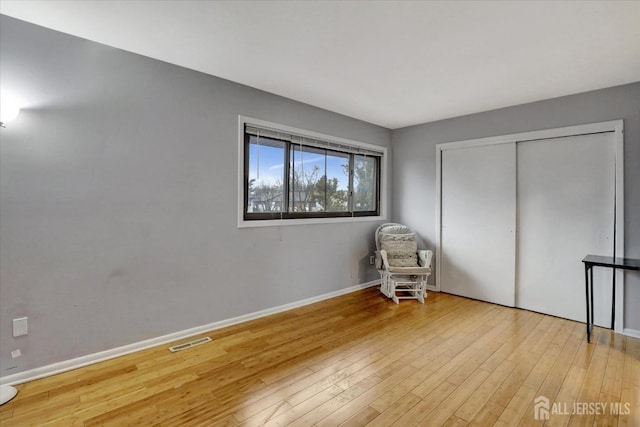 186 Hamilton Pl, East Windsor, NJ 08520 - unfurnished room with wood finished floors and baseboards