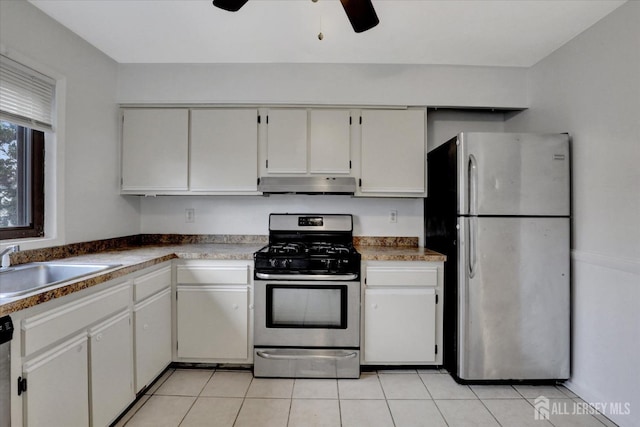 186 Hamilton Pl, East Windsor, NJ 08520 - kitchen featuring stainless steel appliances, under cabinet range hood, a ceiling fan, a sink, and light tile patterned flooring