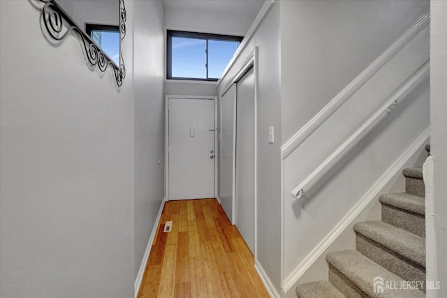 186 Hamilton Pl, East Windsor, NJ 08520 - hallway with stairs and light wood-style floors