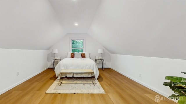 13 Prospect St, Metuchen, NJ 08840 - bedroom featuring vaulted ceiling, light wood-type flooring, and baseboards