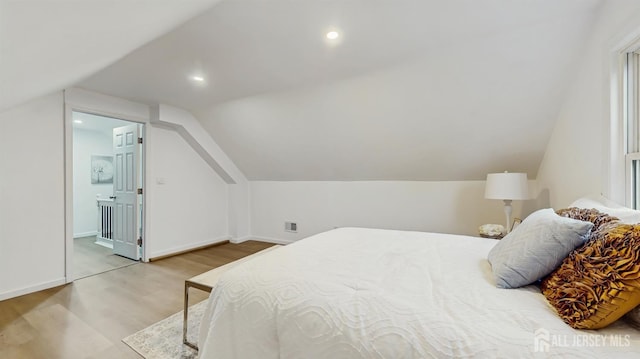 13 Prospect St, Metuchen, NJ 08840 - bedroom featuring wood finished floors, vaulted ceiling, and baseboards