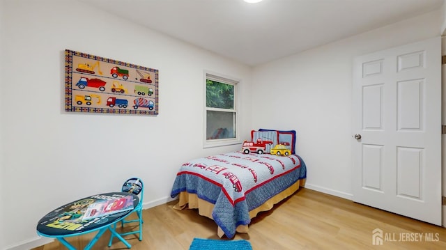 13 Prospect St, Metuchen, NJ 08840 - bedroom with wood finished floors and baseboards