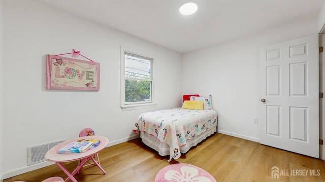 13 Prospect St, Metuchen, NJ 08840 - bedroom featuring wood finished floors and baseboards