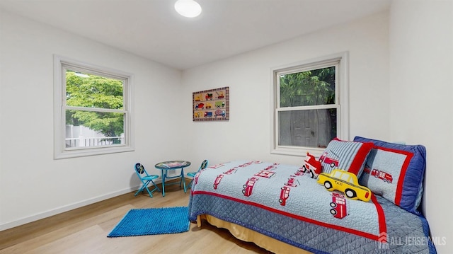 13 Prospect St, Metuchen, NJ 08840 - bedroom featuring wood finished floors and baseboards