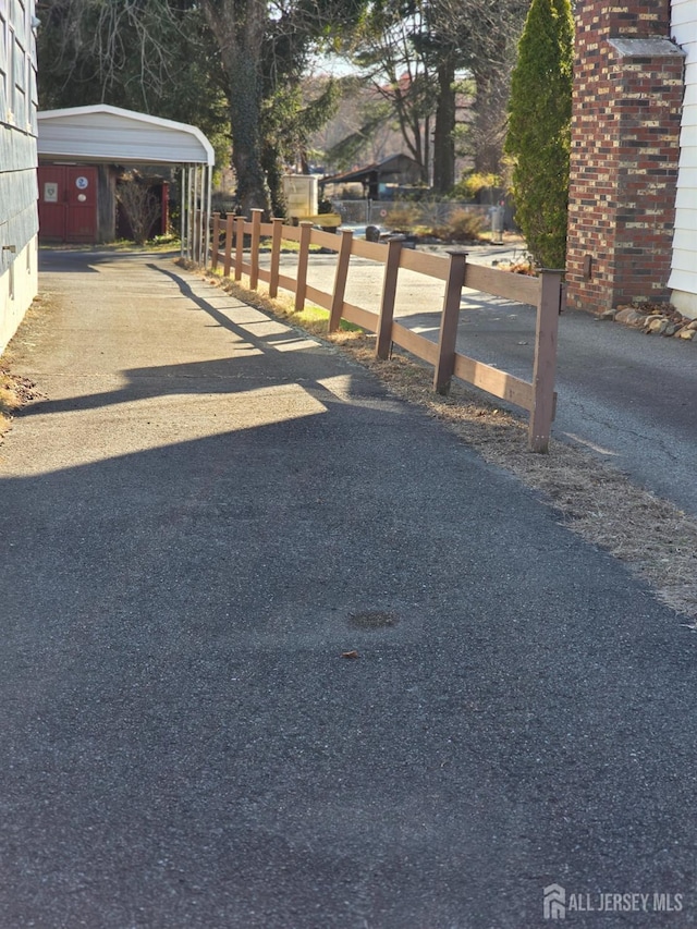 144 Buckelew Ave, Jamesburg, NJ 08831 - view of yard with a carport