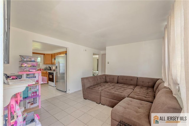 living area featuring light tile patterned floors