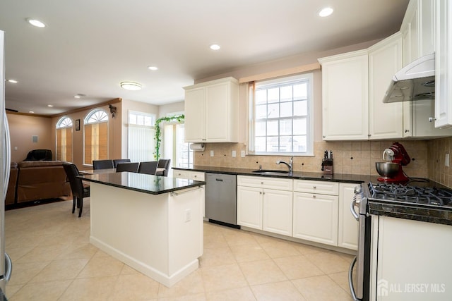 45 Green Ash St, Monroe, NJ 08831 - kitchen with stainless steel appliances, under cabinet range hood, dark countertops, backsplash, and recessed lighting